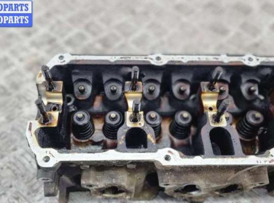 купить Головка блока цилиндров двигателя (ГБЦ) на Volkswagen Touran