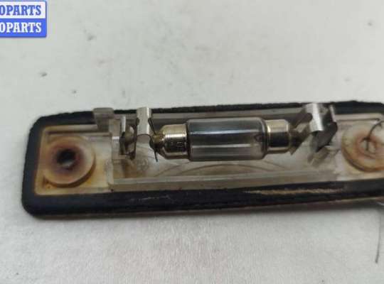 Планка подсветки номера на Opel Zafira A