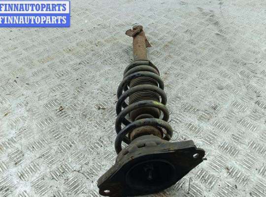 купить Стойка подвески задняя правая на Nissan Primera P12 (2002-2008)