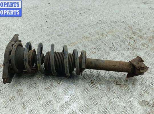 купить Стойка подвески задняя правая на Nissan Primera P12 (2002-2008)