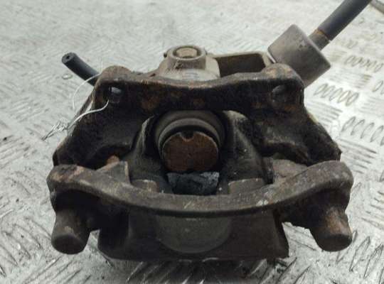 Суппорт задний правый OP2494840 на Opel Astra G (1998-2004)