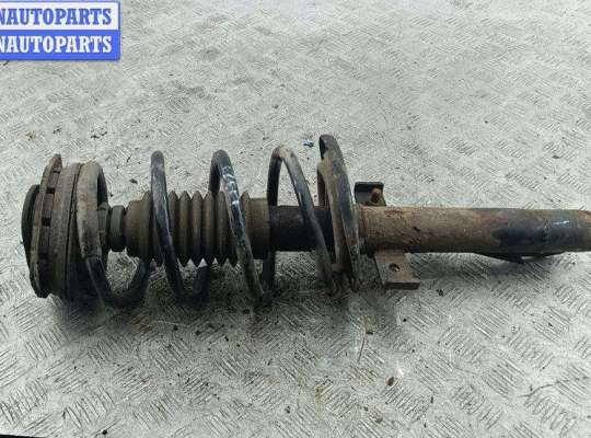 купить Стойка подвески передняя левая на Renault Scenic II (2003-2009)