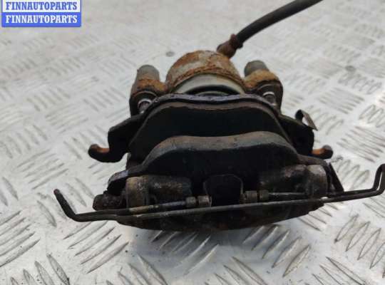 Суппорт передний правый OP2436178 на Opel Astra G (1998-2004)