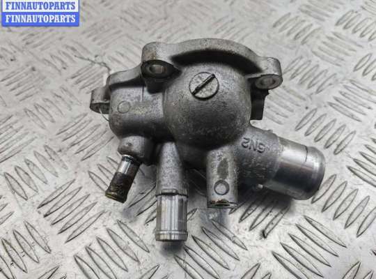 Корпус термостата на Nissan Primera (P12)