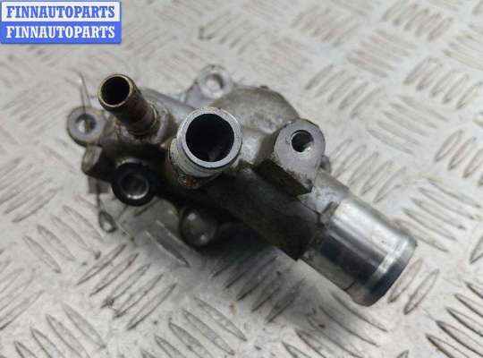 Корпус термостата на Nissan Primera (P12)