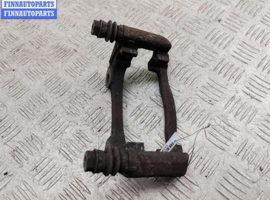 купить Скоба суппорта переднего на Nissan Note