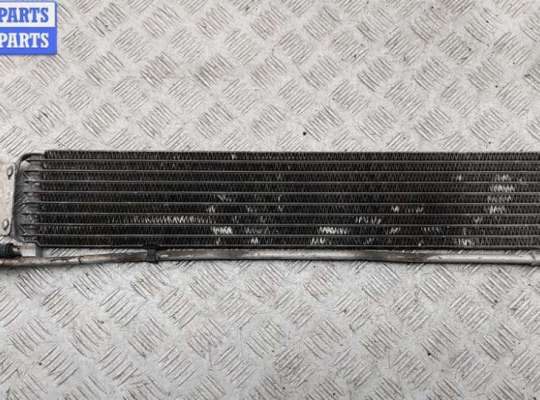 Радиатор масляный OP2385272 на Opel Astra J (2009-2015)