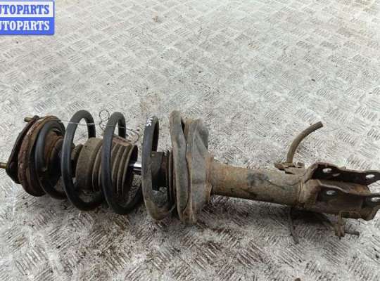 купить Стойка подвески передняя правая на Nissan Almera N16 (2000-2007)