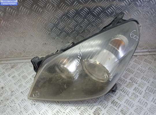 Фара левая OP2349304 на Opel Astra H (2004-2009)