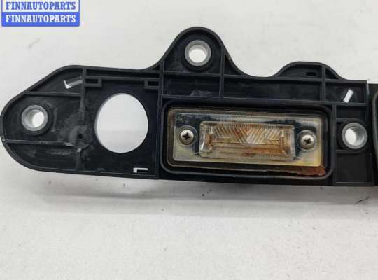 купить Накладка подсветки номера на Volkswagen Passat B6