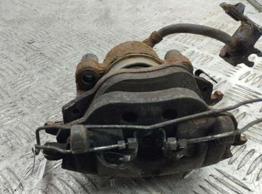 Суппорт передний левый OP2494844 на Opel Astra G (1998-2004)