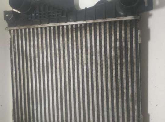 Радиатор интеркулера DGG1507 на Chrysler Voyager (2001-2007)