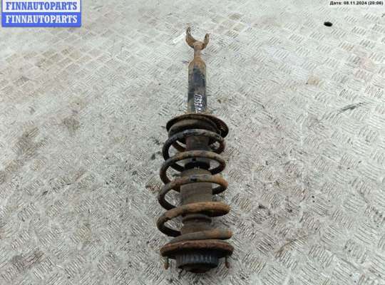 купить Стойка подвески передняя левая на Volkswagen Passat B5