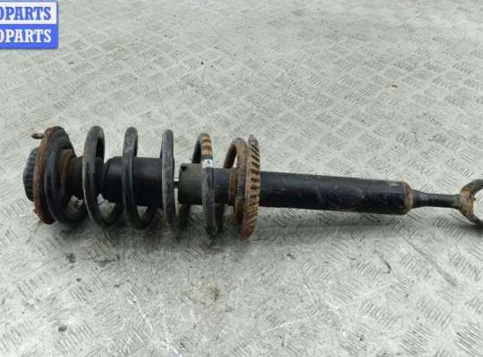 купить Стойка подвески передняя правая на Volkswagen Passat B5