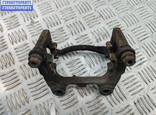 Скоба суппорта заднего VG2756743 на Volkswagen Passat B6