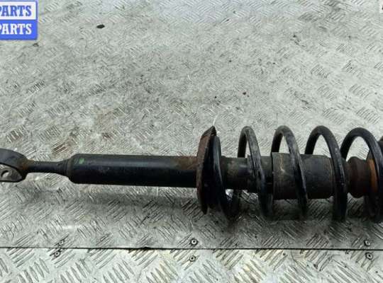 купить Стойка подвески передняя левая на Volkswagen Passat B5