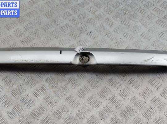 Накладка подсветки номера OP2437984 на Opel Astra G (1998-2004)