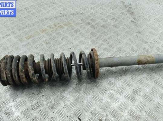 купить Стойка подвески задняя левая на Volkswagen Passat B4