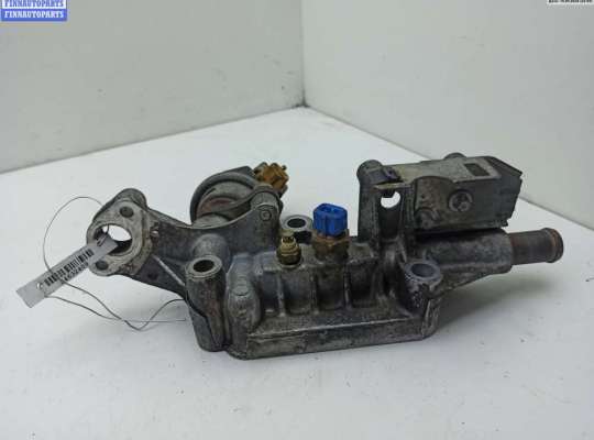 Фланец (тройник) системы охлаждения на Opel Vectra B
