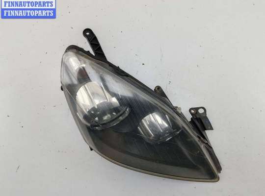 Фара передняя на Opel Zafira B