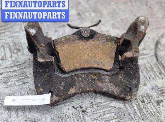 Скоба суппорта заднего VG2573034 на Volkswagen Passat B4