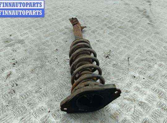 купить Стойка подвески задняя левая на Nissan Primera P12 (2002-2008)