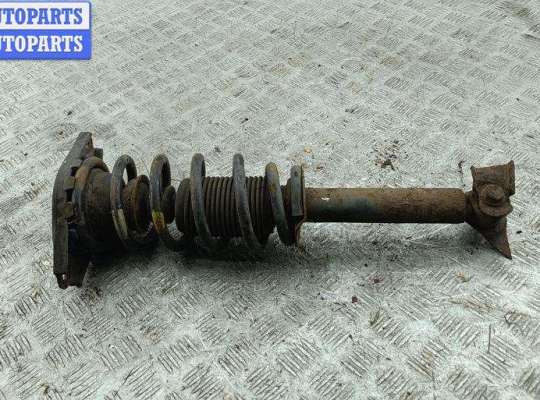 купить Стойка подвески задняя левая на Nissan Primera P12 (2002-2008)