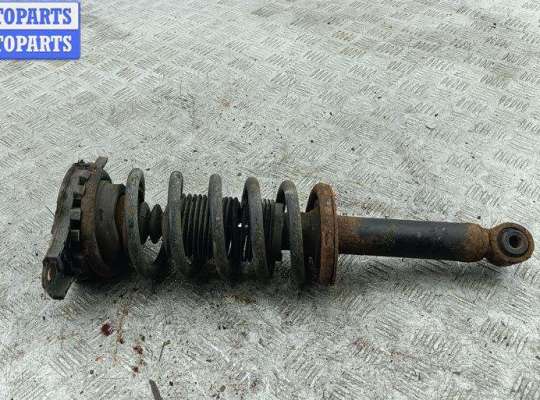 купить Стойка подвески задняя правая на Nissan Primera P11 (1999-2002)