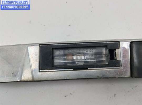 купить Накладка подсветки номера на Opel Astra H (2004-2009)