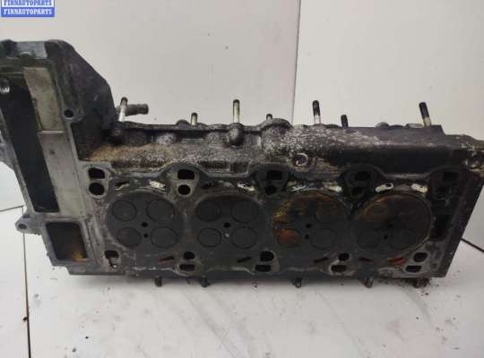 Головка блока цилиндров двигателя (ГБЦ) OP2262334 на Opel Zafira A (1999-2005)