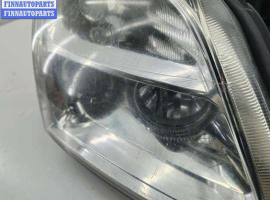 Фара передняя на Opel Vectra C