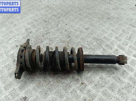 купить Стойка подвески задняя левая на Nissan Primera P11 (1999-2002)