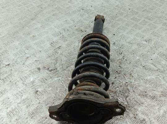 купить Стойка подвески задняя левая на Nissan Primera P11 (1999-2002)