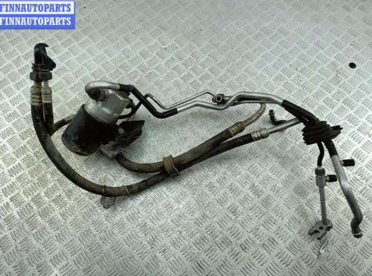 Трубка кондиционера VG2723848 на Volkswagen Passat B5