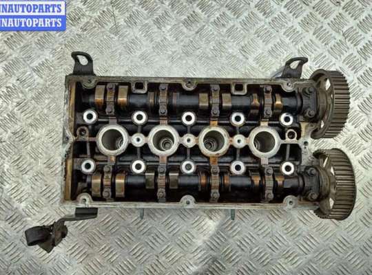 Головка блока цилиндров двигателя (ГБЦ) OP2430931 на Opel Astra H (2004-2009)