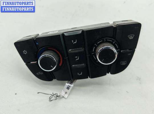 Переключатель отопителя OP2359347 на Opel Astra J (2009-2015)