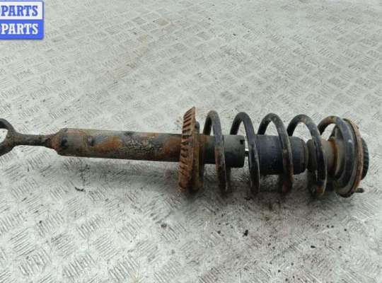 купить Стойка подвески передняя левая на Volkswagen Passat B5