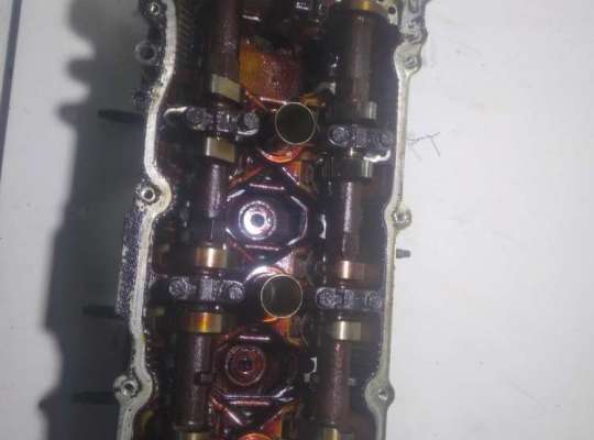 Головка блока цилиндров двигателя (ГБЦ) NS590899 на Nissan Murano