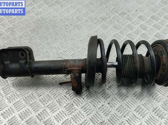 Стойка подвески амортизационная на Opel Omega B