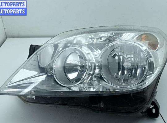 Фара левая OP2341843 на Opel Astra H (2004-2009)