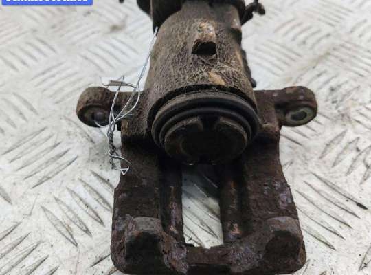 Суппорт задний правый NS995328 на Nissan Almera N16 (2000-2007)