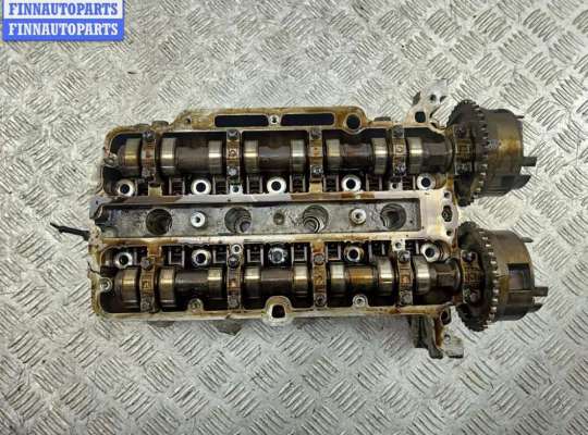 Головка блока цилиндров двигателя (ГБЦ) OP2395478 на Opel Astra J (2009-2015)