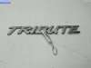 купить Эмблема на Mazda Tribute