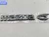 купить Эмблема на Mazda 6 (2002-2007) GG/GY
