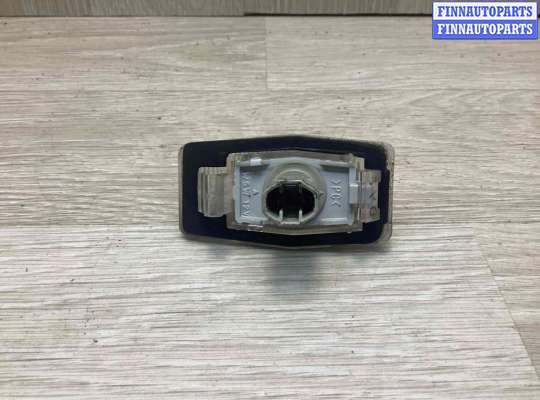 Планка подсветки номера на Mazda 323 (BA) 323C/ 323F/ 323S/ 323P