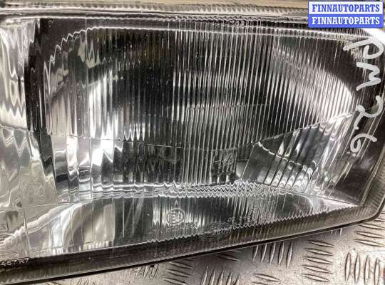 Фара передняя на Audi 100 (44Q, C3)