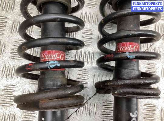 Стойка подвески амортизационная на Mitsubishi Lancer IX