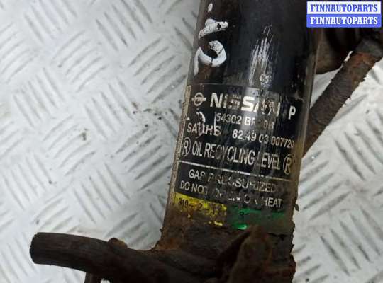 Стойка подвески амортизационная на Nissan Qashqai I (J10)