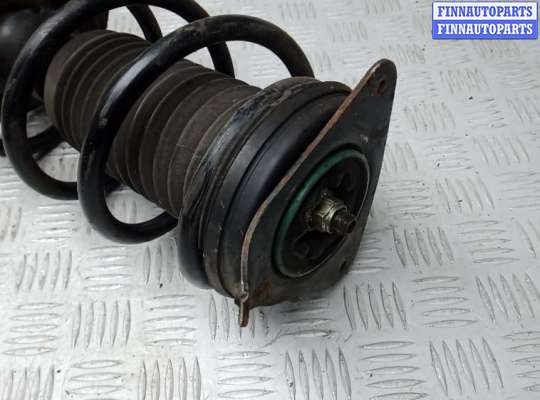 Стойка подвески амортизационная на Nissan Qashqai II (J11)