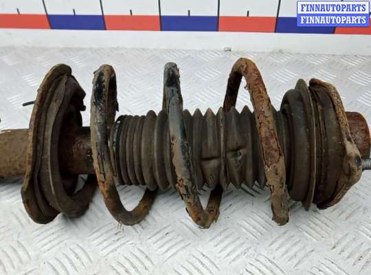 Стойка подвески амортизационная на Kia Sportage III (SL)